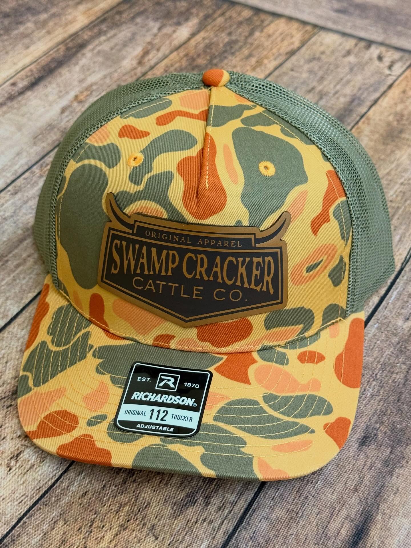 Instagram post with the caption: 🧢🔥 NEW DROP ALERT 🔥🧢

The Swamp Cracker Cattle Co. Full Logo...